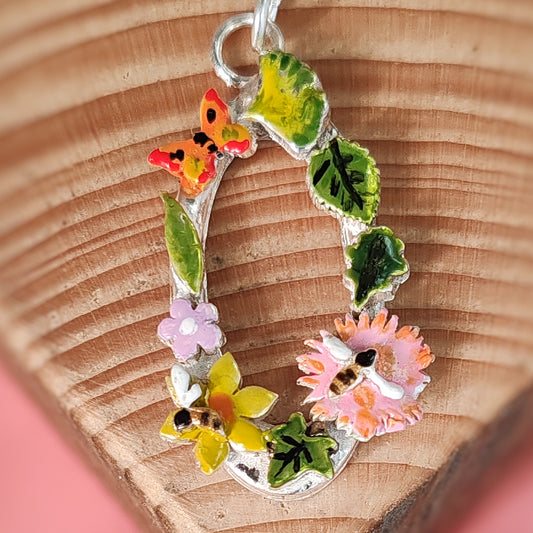 Oval Wreath Necklace With Orange Butterfly
