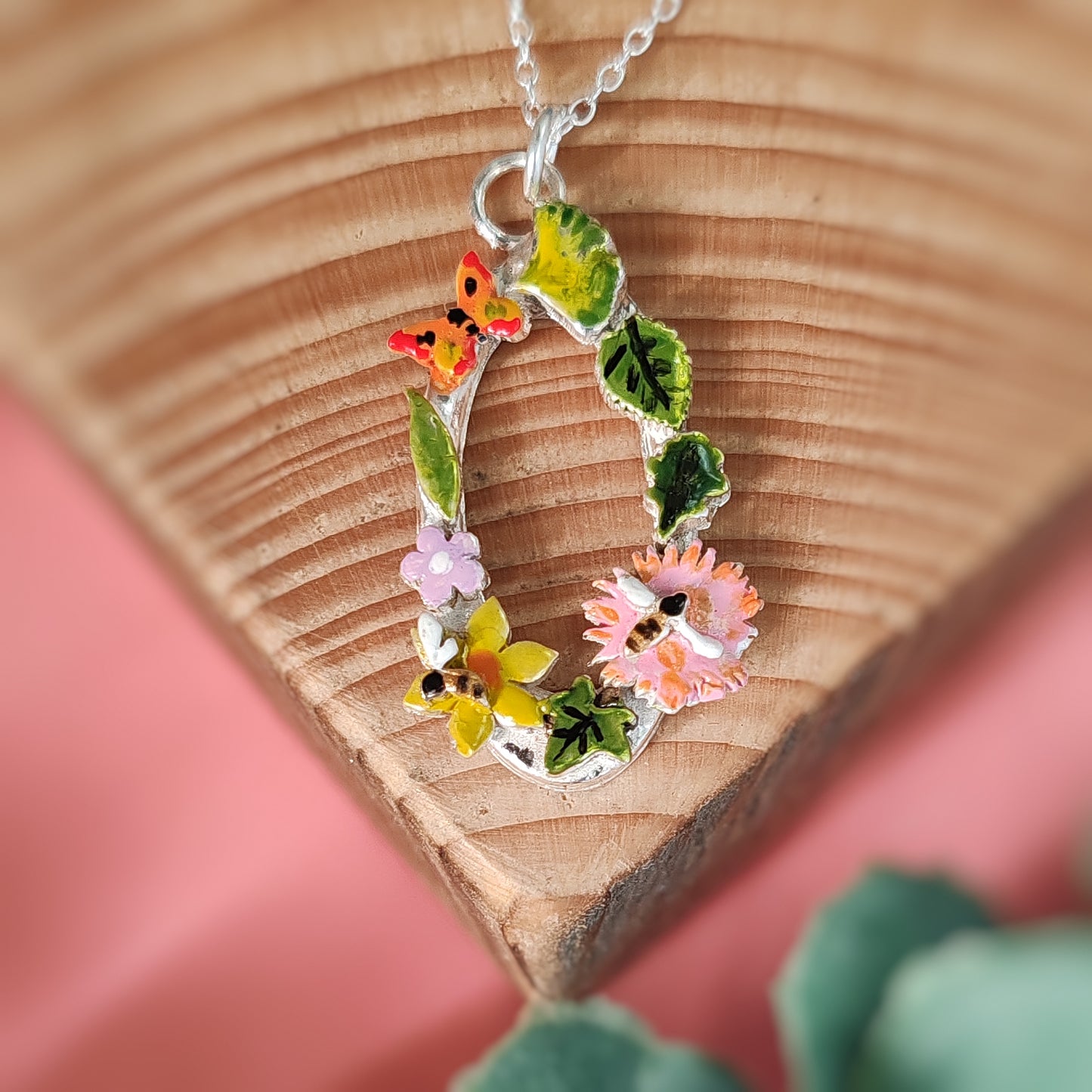 Oval Wreath Necklace With Orange Butterfly