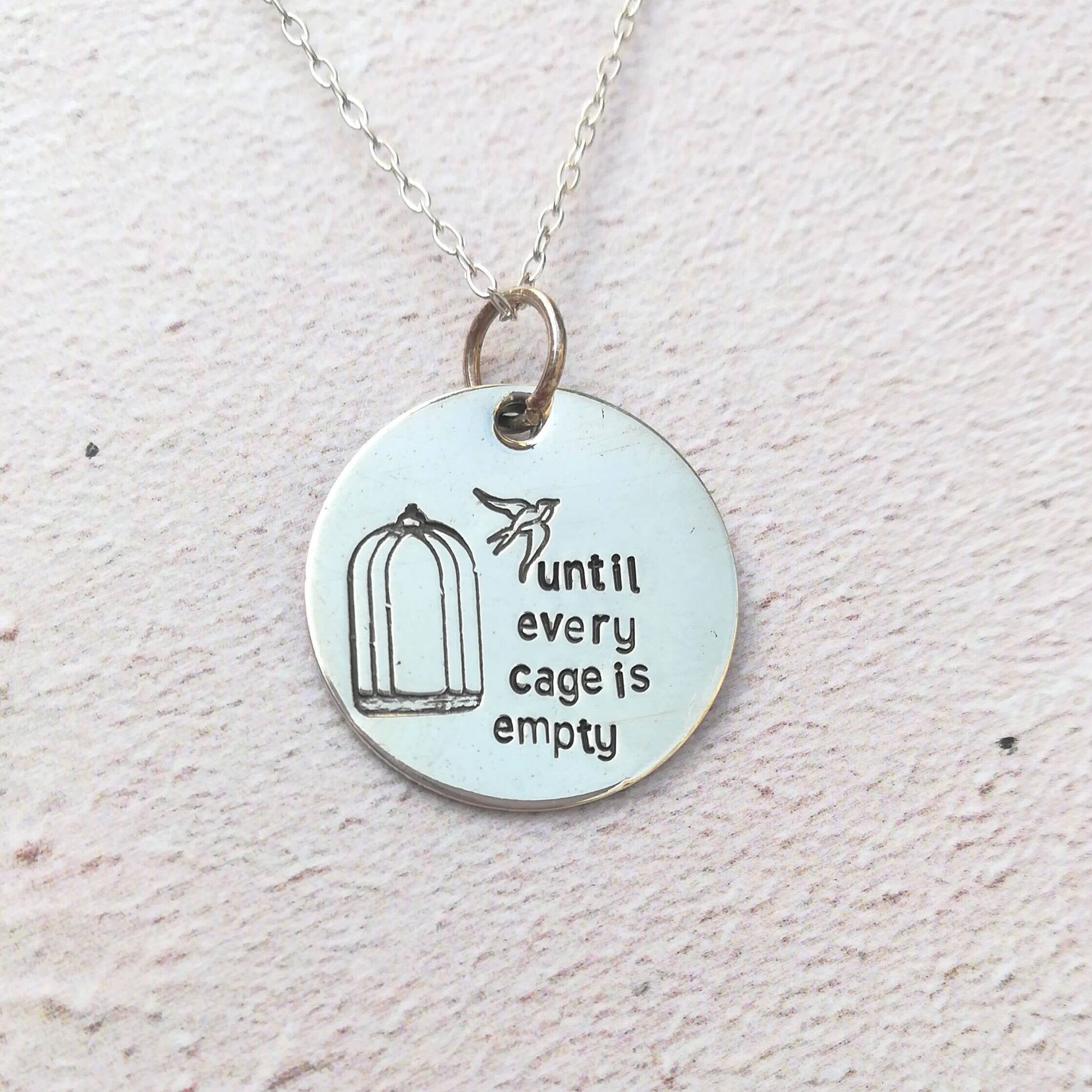 Until every cage is empty Necklace
